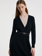 a lady in black tencel v-neck dress with belt